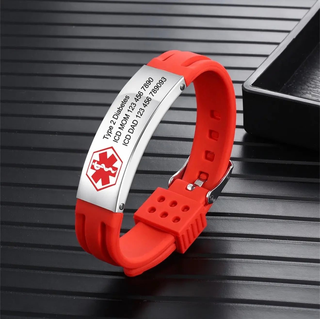 Red medical alert ID bracelet for Type 2 Diabetes with emergency contact info engraved.