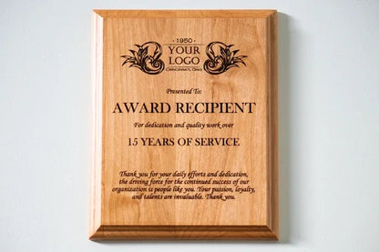 Wooden employee recognition plaque for 15 years of service with engraved text and logo area.