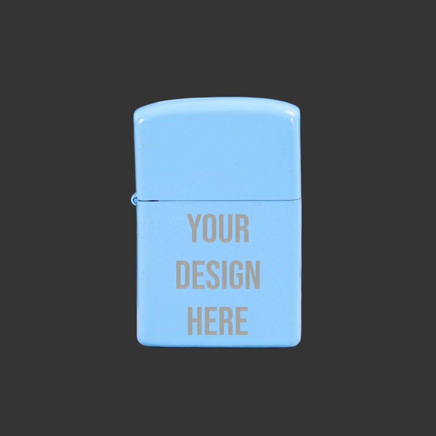 Pale blue engraved lighter with 'Your Design Here' text on dark background