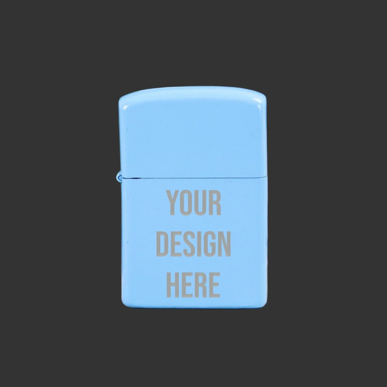 Pale blue engraved lighter with 'Your Design Here' text on dark background