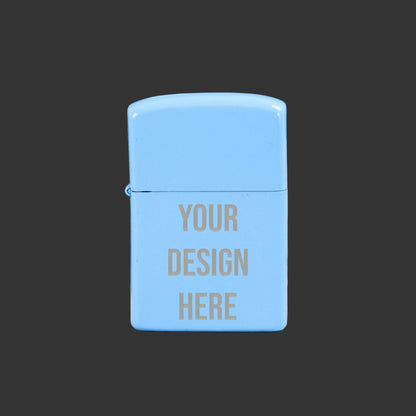 Pale blue engraved lighter with 'Your Design Here' text on dark background