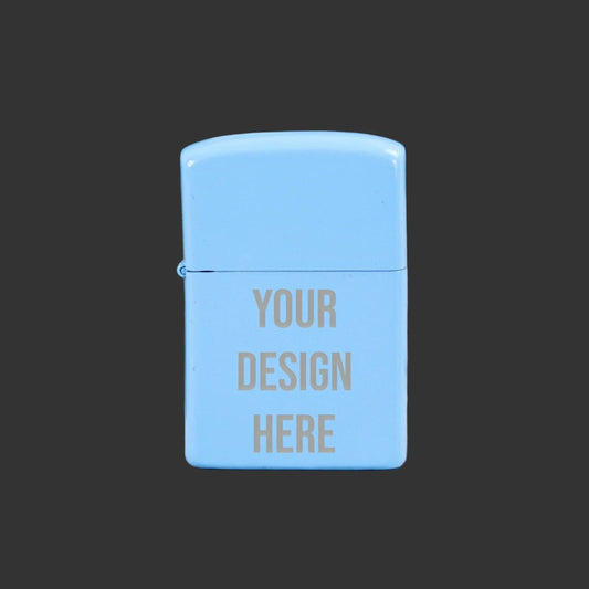 Pale blue engraved lighter with 'Your Design Here' text on dark background